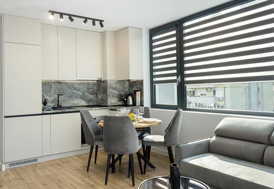 Kitchen or kitchenette, Living room, Seating area, Dining area
