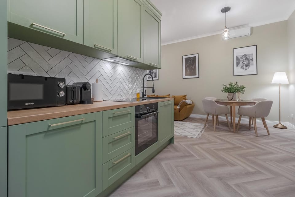 Kitchen or kitchenette, Dining area, dishwasher, oven, stove, toaster