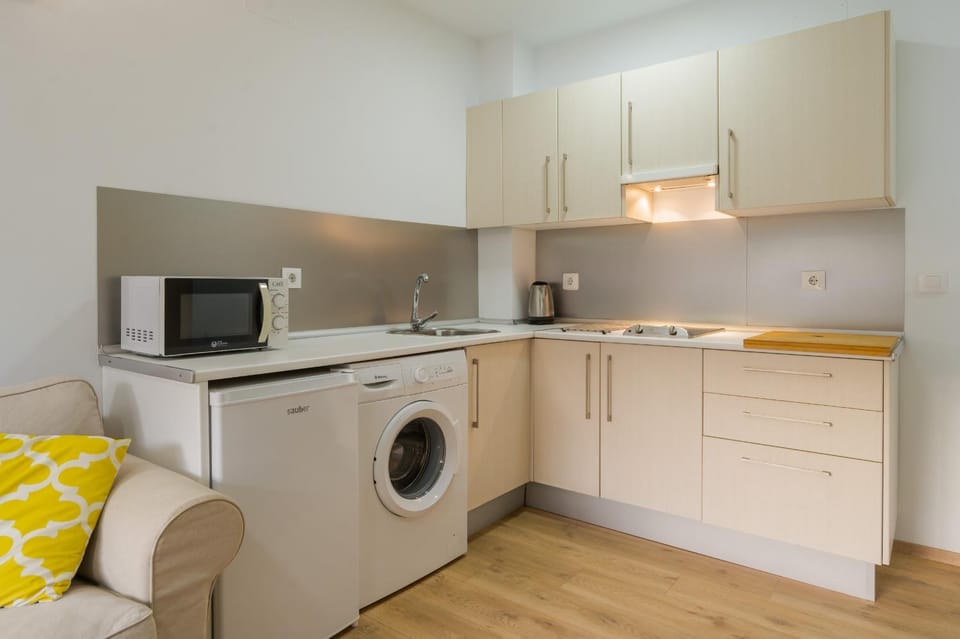 Kitchen or kitchenette, washing machine
