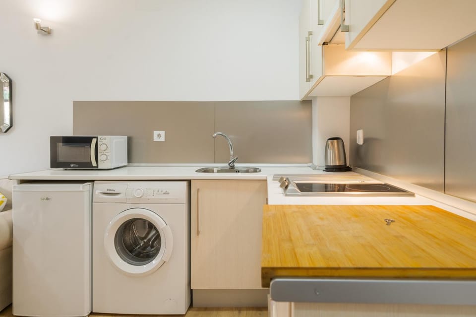 Kitchen or kitchenette, washing machine