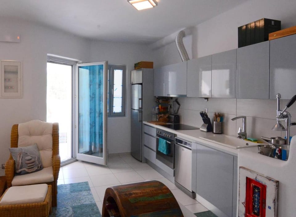 Coffee/tea facilities, Living room, Seating area, dishwasher, oven, toaster