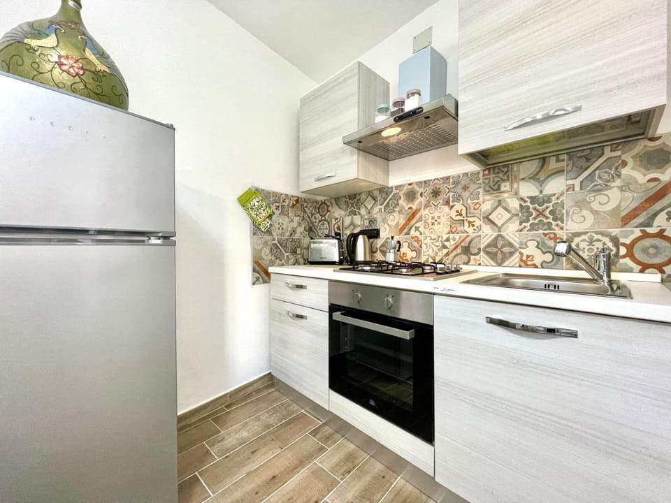 Kitchen or kitchenette, oven, stove