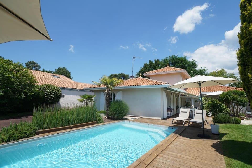 Property building, Patio, Garden, Swimming pool