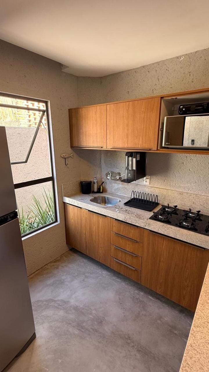Kitchen or kitchenette, stove