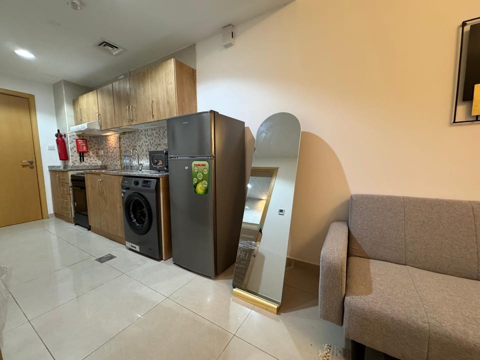 ASHRI HH Spacious Studio in May Residence JVC Apartment in Dubai