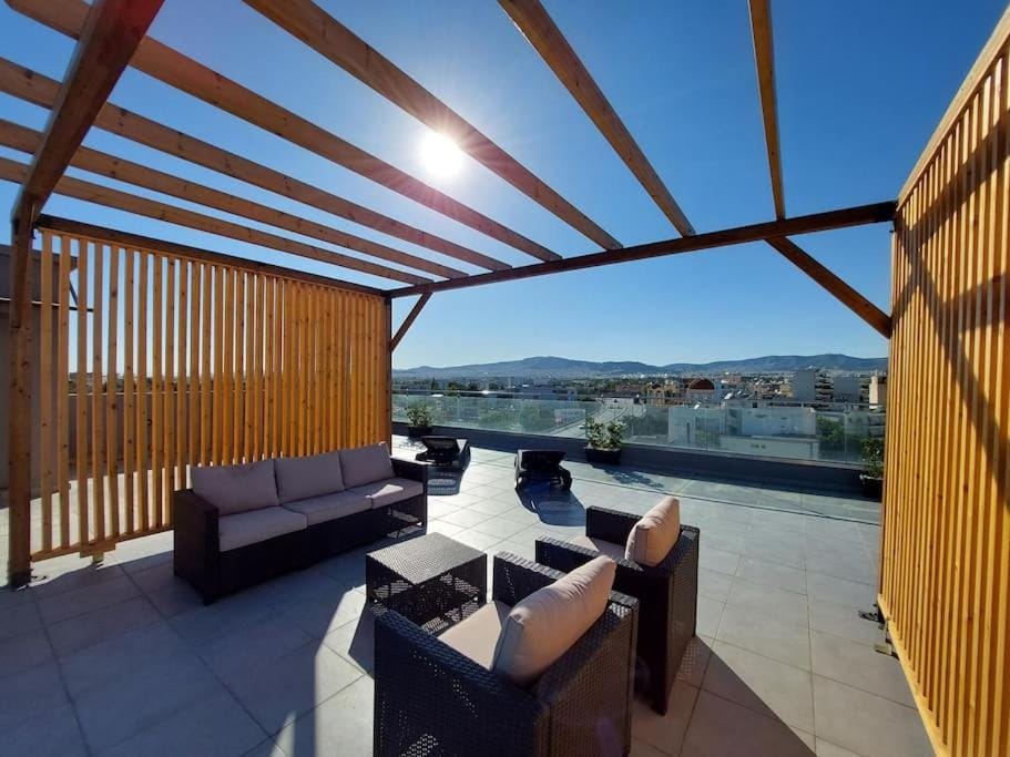 Modern & Spacious 2 Bedroom Apartment with Rooftop Acropolis View Access Apartment in Athens