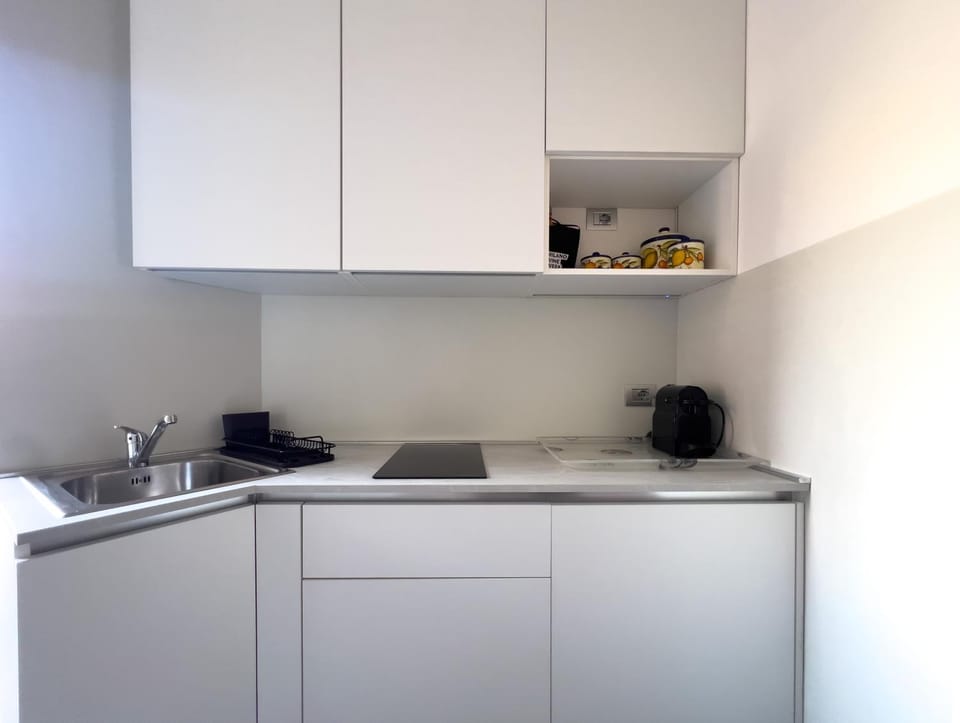Kitchen or kitchenette, stove