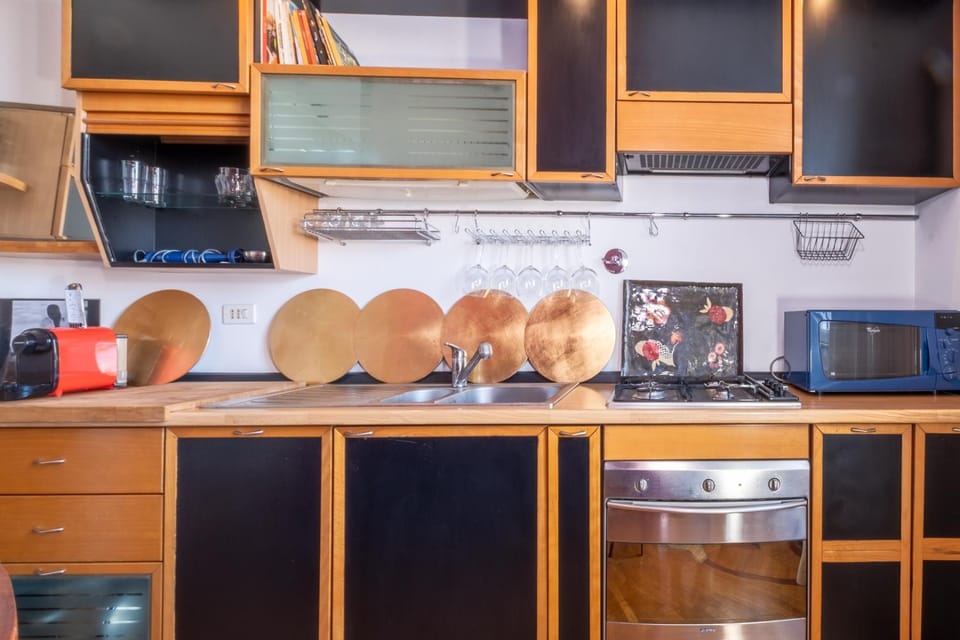 Kitchen or kitchenette, dishwasher, oven, stove, toaster