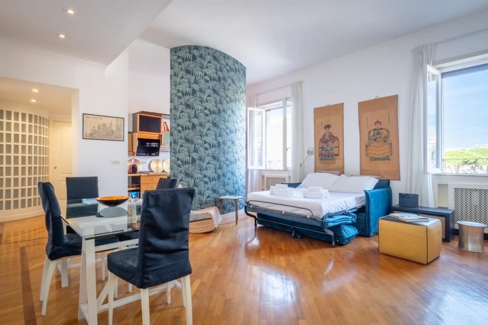 Bed, TV and multimedia, Living room, Seating area