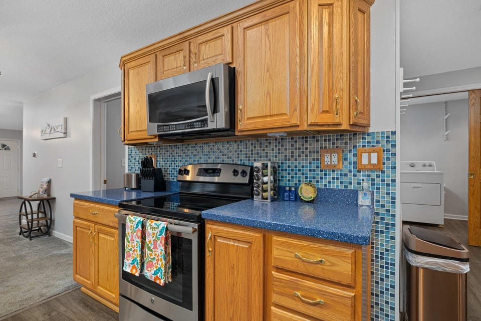 Kitchen or kitchenette, oven, stove, toaster