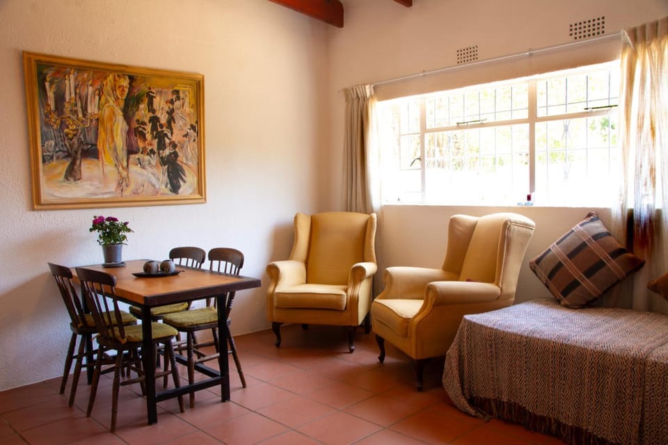 Living room, Seating area, Dining area, Garden view