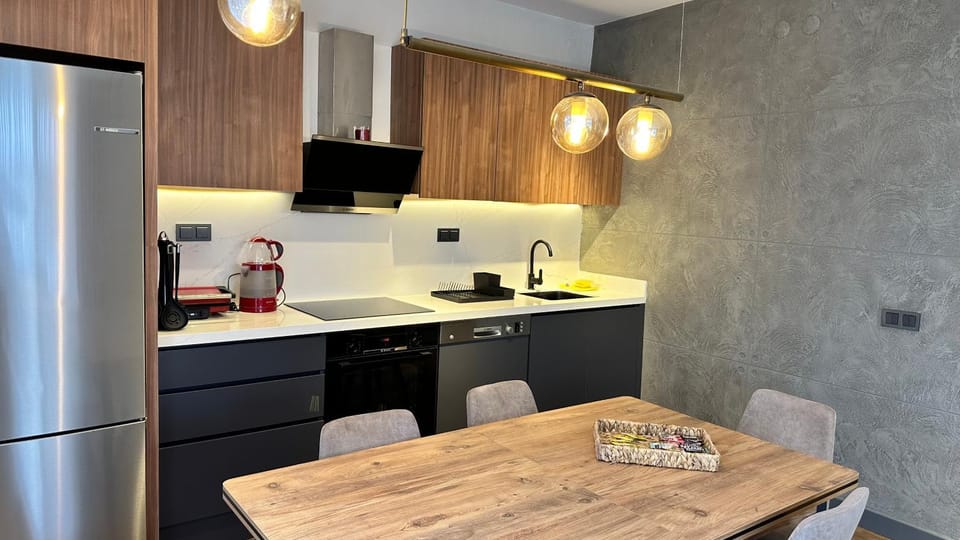 Dining area, dishwasher, oven, stove, toaster, kitchen