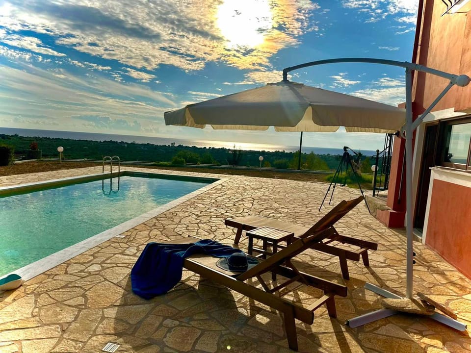 Patio, Day, Natural landscape, Pool view, Swimming pool, Swimming pool, sunbed