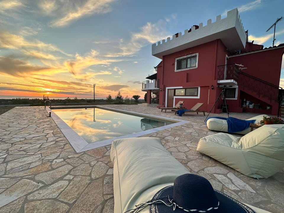 Patio, Natural landscape, View (from property/room), Pool view, Swimming pool, Swimming pool, Sunset, sunbed