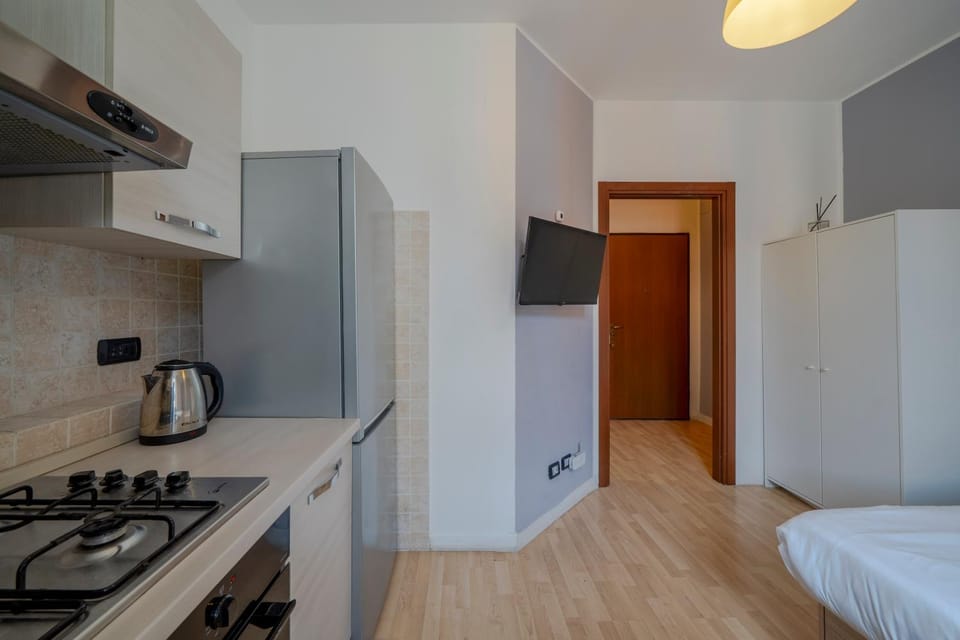 Photo of the whole room, stove