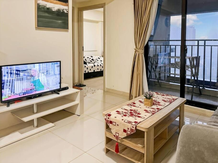 Large 3BR Meikarta Apt with WiFi & Netflix by 2ndHome Apartment in West Java