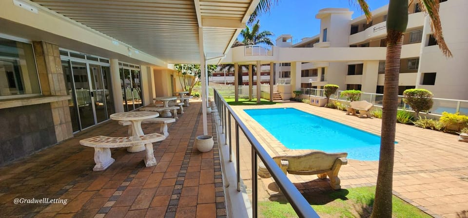 Property building, Patio, Day, View (from property/room), Pool view, Swimming pool