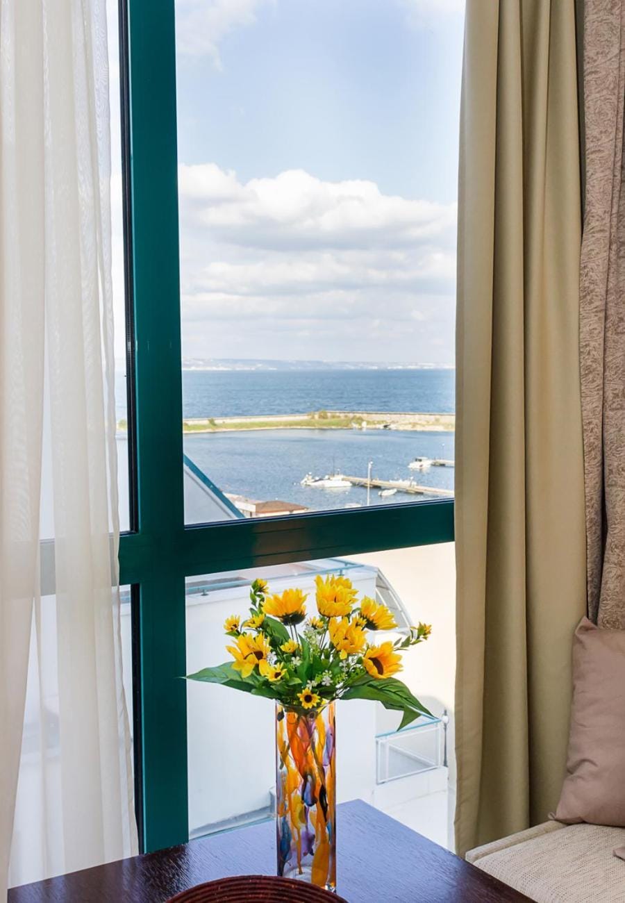 View (from property/room), Living room, Seating area, Sea view