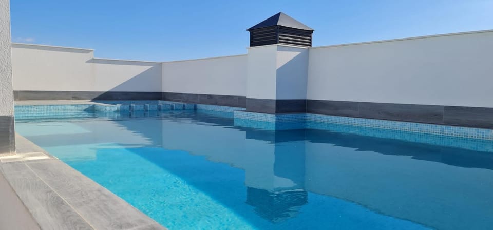 Premium Apartment 8 pers with a rooftop swimming pool and sea views - 3 min Playa de Cura Apartment in Torrevieja