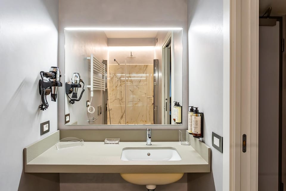 Shower, Bathroom, bidet, hair dryier, towels