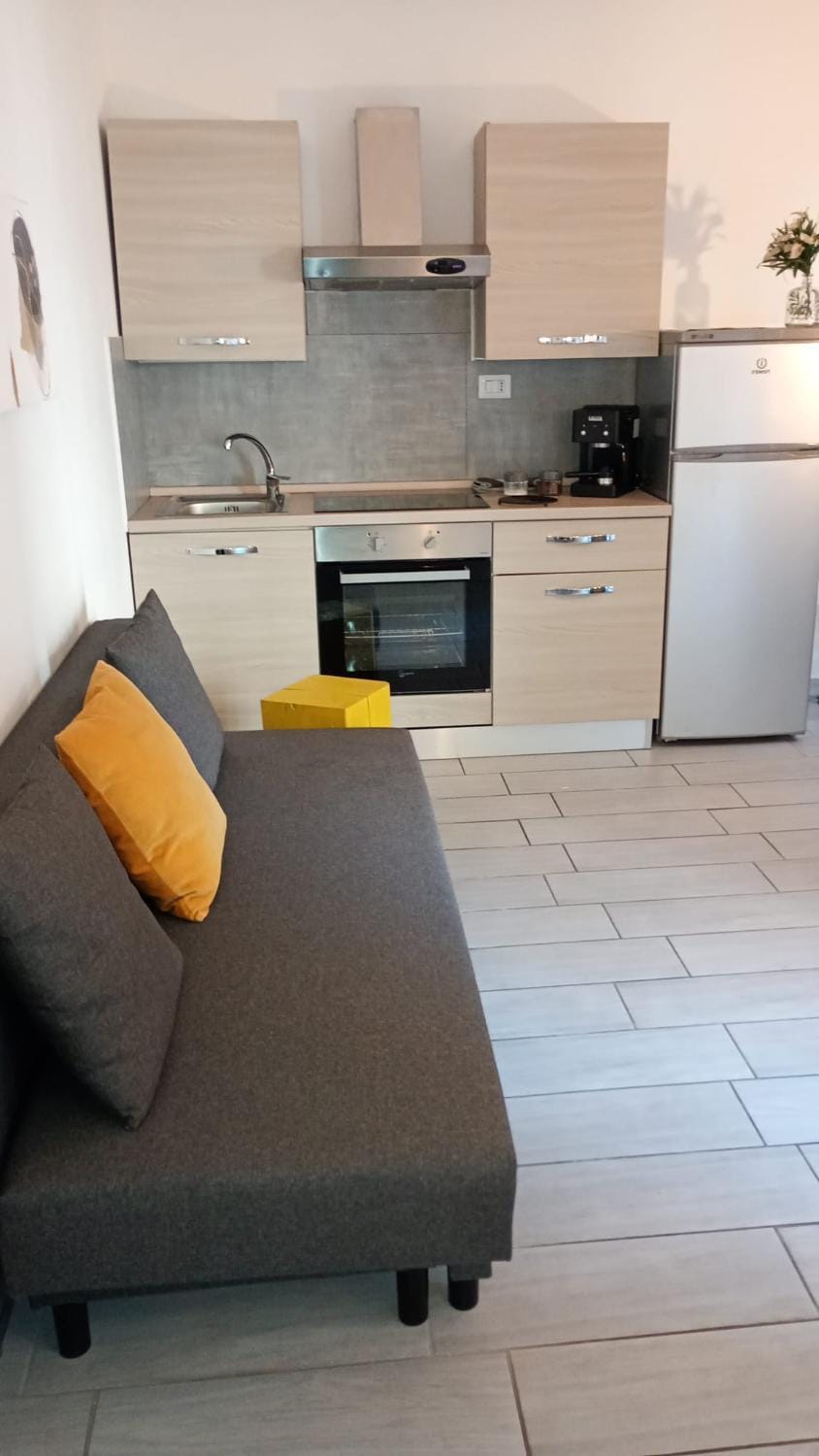 Kitchen or kitchenette, Living room, stove