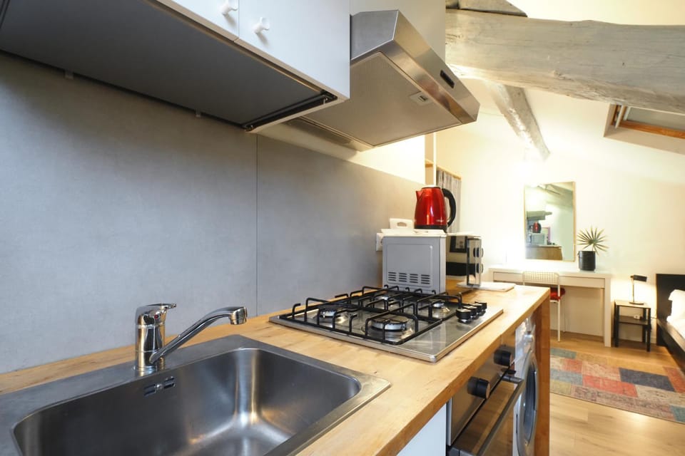 Kitchen or kitchenette, stove