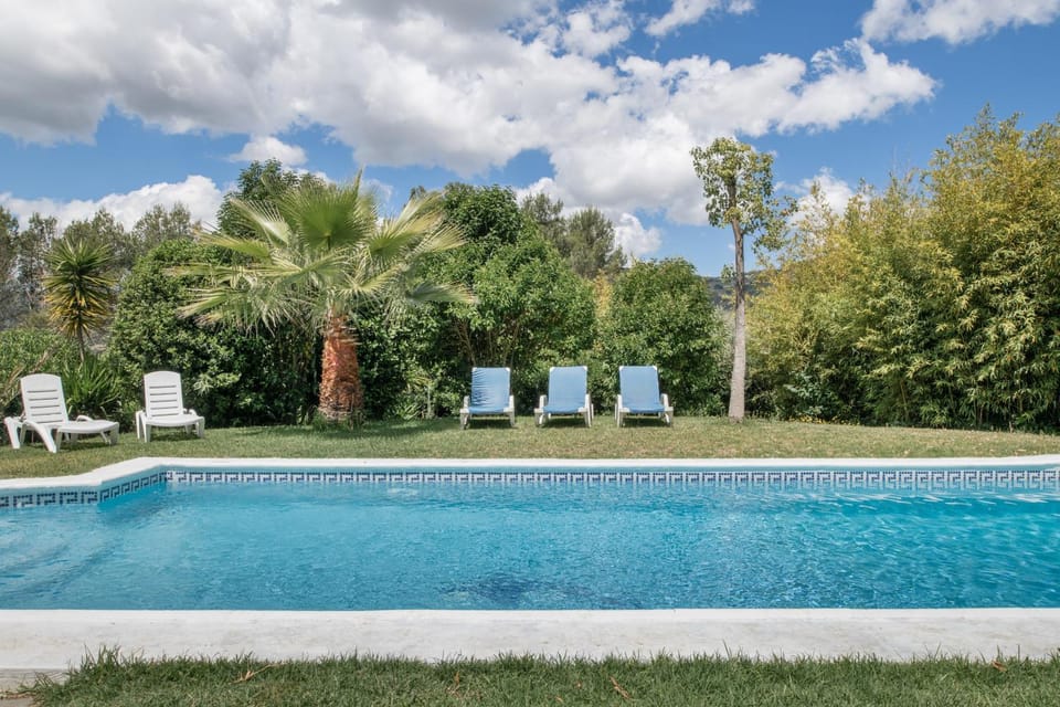 Property building, Living room, Swimming pool