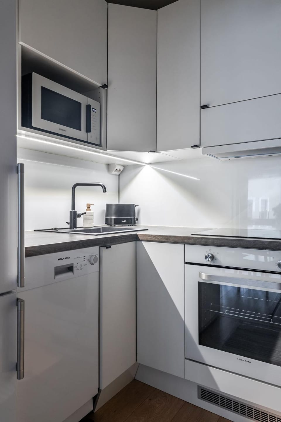 Kitchen or kitchenette, oven, toaster