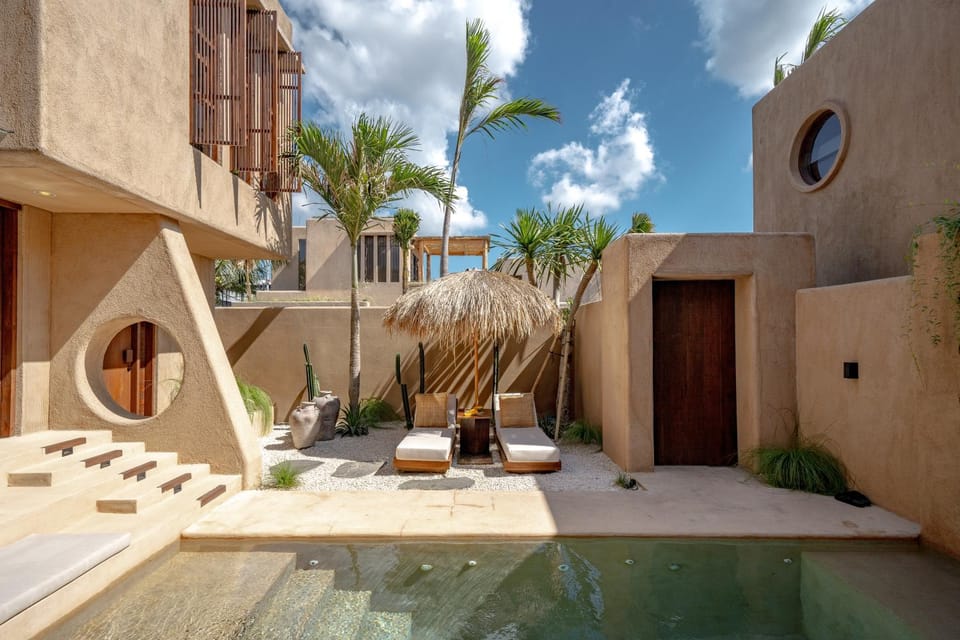Property building, Patio, Pool view, Swimming pool, sunbed