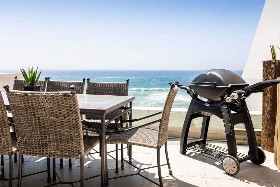 Patio, BBQ facilities, Dining area, Beach, Sea view