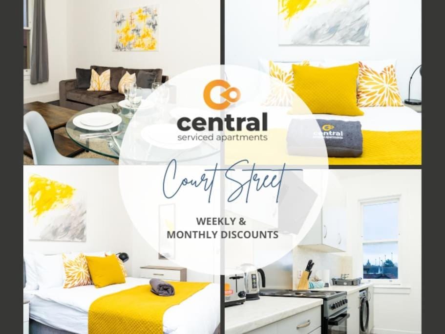 Bed, Property logo or sign, Living room, Photo of the whole room, Seating area, Dining area, Logo/Certificate/Sign, Bedroom, Text overlay, Certificate/Award