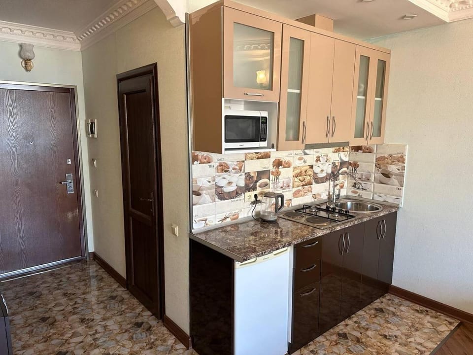 Kitchen or kitchenette, stove
