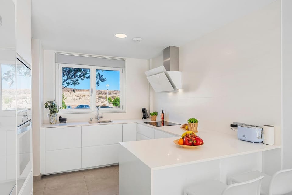 Kitchen or kitchenette, stove, toaster