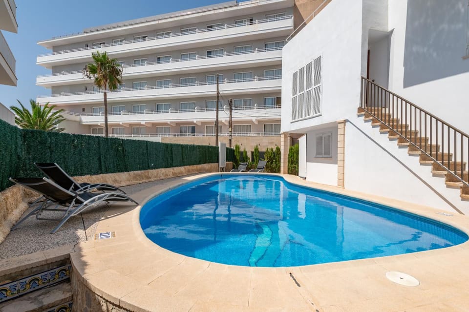 Property building, Patio, Day, View (from property/room), Pool view, Swimming pool, Swimming pool, sunbed