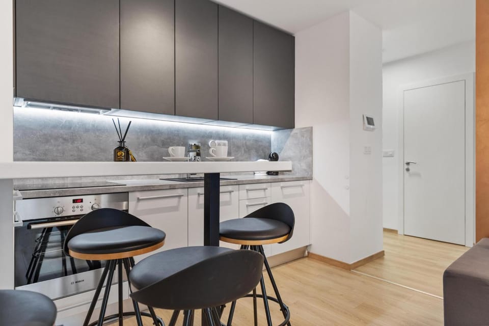Kitchen or kitchenette, Living room, Seating area, Dining area, dishwasher, oven, stove