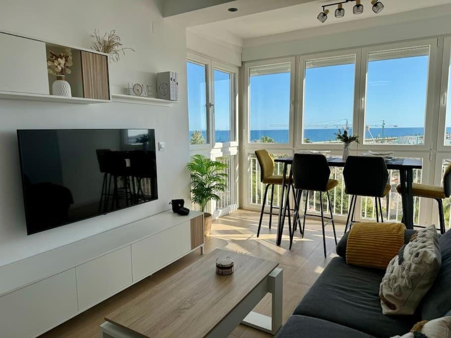 TV and multimedia, View (from property/room), Balcony/Terrace, Living room, Seating area, Dining area, Sea view
