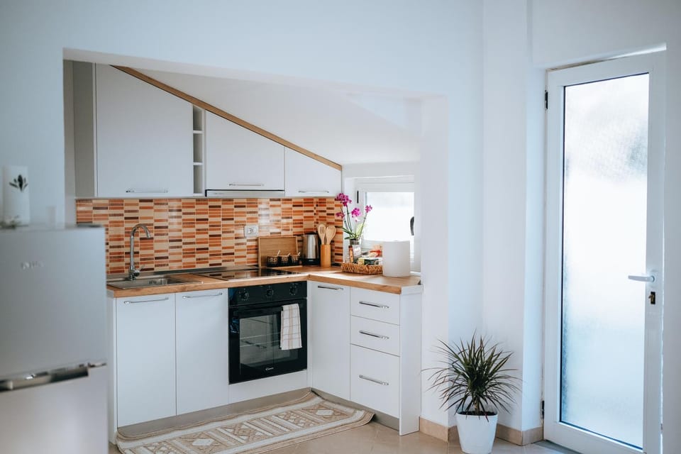 Kitchen or kitchenette, stove, kitchen