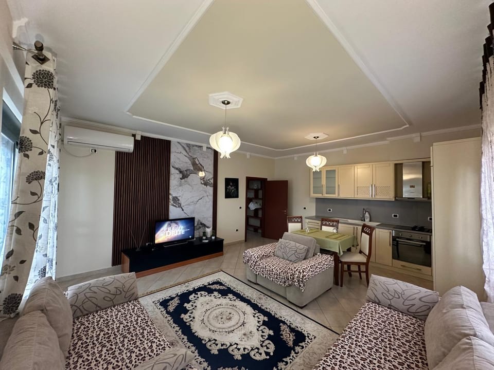Kitchen or kitchenette, Living room, Seating area, Dining area, stove
