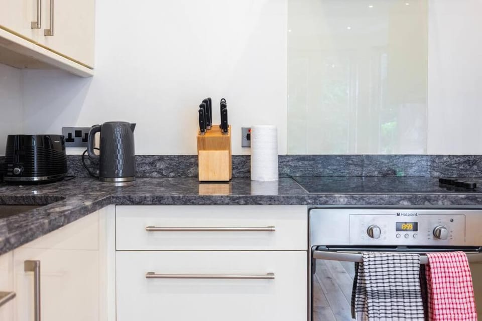 Kitchen or kitchenette, oven, toaster