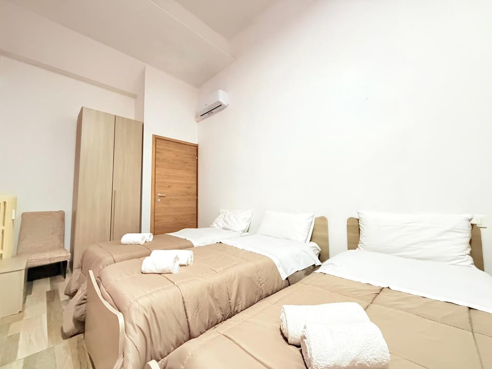 Bed, Photo of the whole room, Bedroom, towels, wardrobe, air conditioner