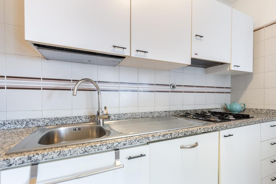 Kitchen or kitchenette, stove