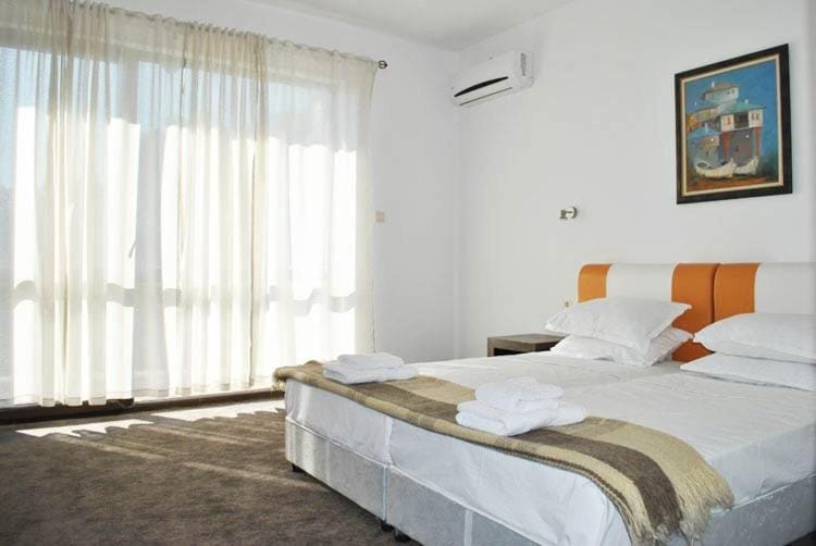 Bed, Photo of the whole room, Bedroom, towels, air conditioner