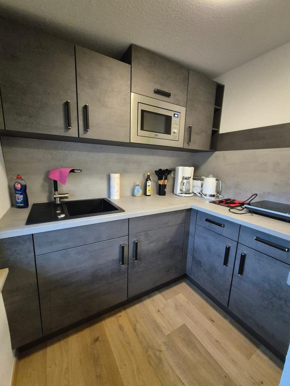 Kitchen or kitchenette, stove, toaster