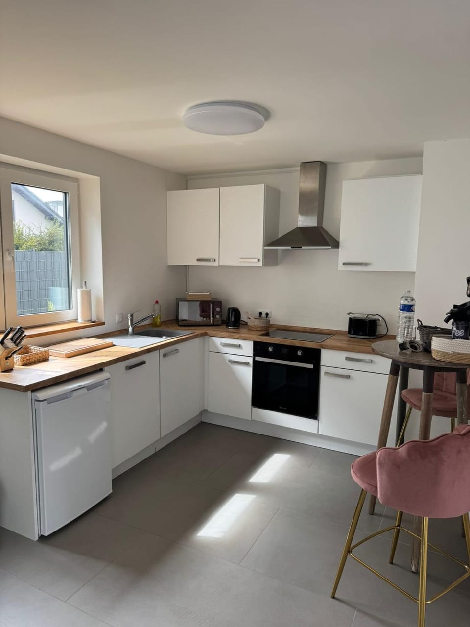 Kitchen or kitchenette, dishwasher, oven, stove, toaster