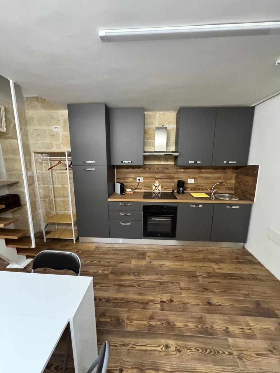 Kitchen or kitchenette, stove