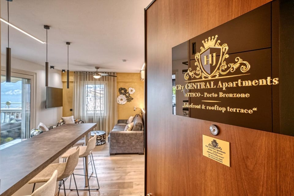 Communal lounge/ TV room, Property logo or sign, Living room, Seating area, Logo/Certificate/Sign