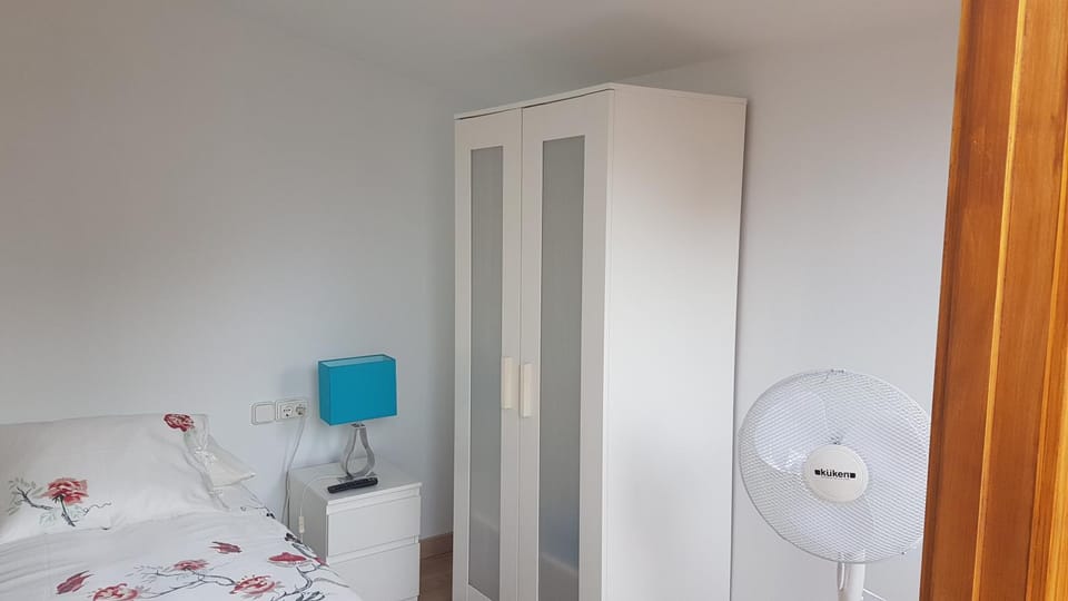 Bed, wardrobe