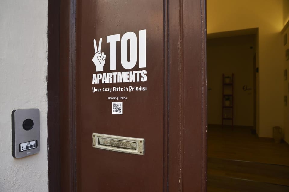 Property building, Facade/entrance, Property logo or sign, Lobby or reception, Logo/Certificate/Sign, Text overlay