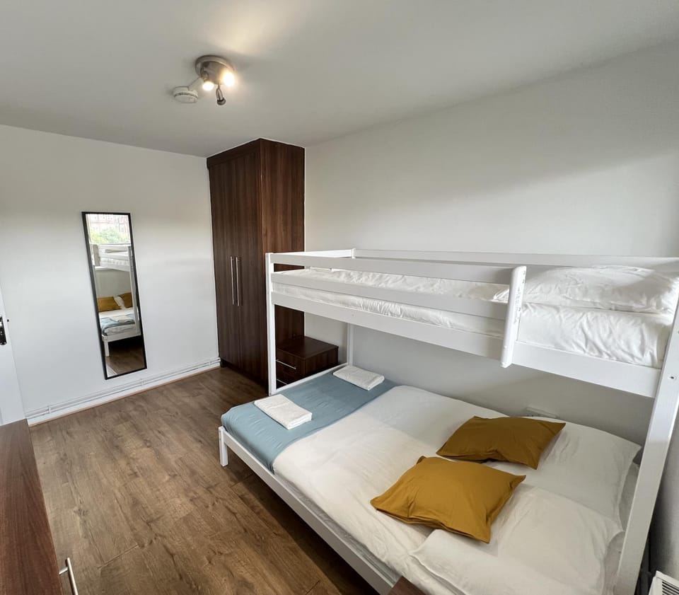 Bed, Photo of the whole room, Bedroom, bunk bed, towels, wardrobe