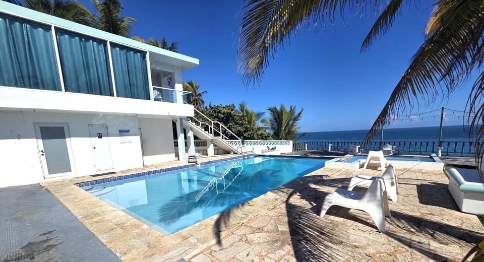 Property building, Day, View (from property/room), Pool view, Sea view, Swimming pool